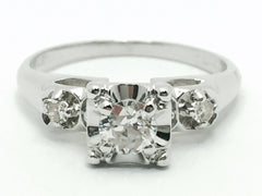 Three stone diamond and 14kt white gold engagement ring